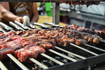 Typical italian barbeque meal called bombette at street food fair Turin Italy September 18 2021