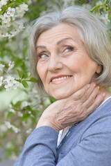 happy smiling senior woman outdoors