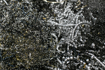 Metal shavings and sawdust after work of cnc machining.