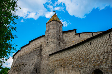 Fototapeta premium Historical and architectural center of the 12th century in the old city of Pskov, Russia. Medieval fortress and temple complex. Travel summer tourism holiday vacation.