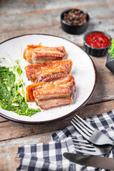 pork ribs or beef fried grill B-B-Q fatty food spices spicy marinade fresh portion ready to eat meal snack on the table copy space food background rustic. top view