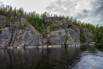 Fototapeta na wymiar Ladoga skerries and the shores of Lake Ladoga