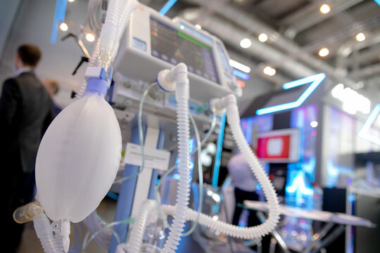 Oxygen mask as part of artificial lungs ventilation machine in surgery room, closeup. Space for text
