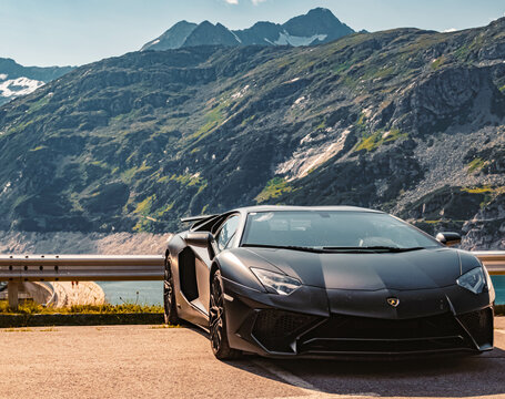 Beautiful alpine summer view with details of a famous super car at the Koelnbreinsperre, Maltatal, Kaernten, Austria