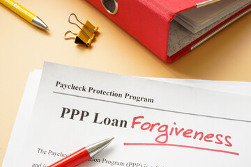 PPP loan forgiveness handwritten word on the application.