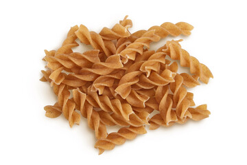 Wolegrain fusilli pasta from durum wheat isolated on white background with clipping path and full depth of field. Top view. Flat lay.