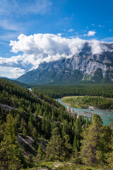 Sunny morning view of the Hoodoos in Banff National Park with the Bow River in the background.