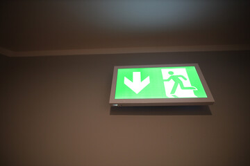 Emergency exit sign on the office wall