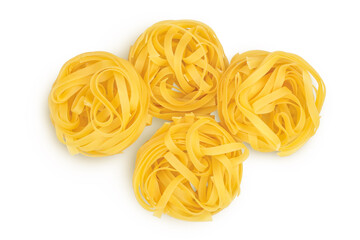 Raw tagliatelle pasta isolated on white background with clipping path and full depth of field. Top view. Flat lay