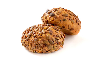 Round rye bread with seeds isolated on white background. Rye buns with sunflower and pumpkin seeds.