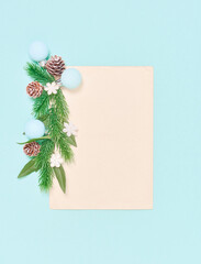 Christmas background. Top view of Christmas decorations. Flat lay of creative design on blue background. Copy space for text.