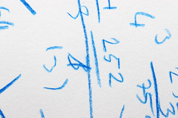 blue drawing of a person on a blackboard