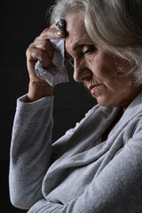 Close up portrait of sad senior woman