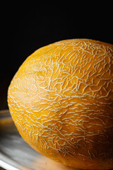 Melon, honey melon on wooden table background.