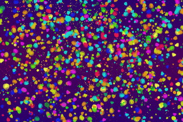 Multicolored spots and splashes on a purple background