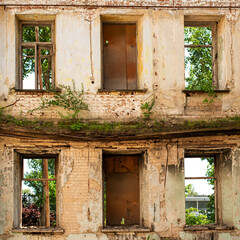 Old brick ruins with windows. Interior of an abandoned building