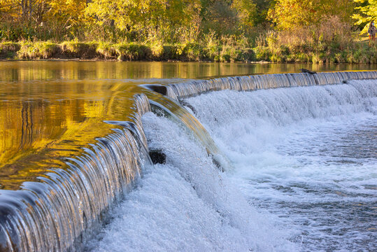 Old Mill dam at Humber River in Autumn, Toronto, Ontario, Canada