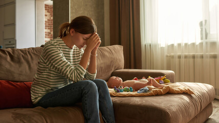 Worried mother feeling helpless staying with child day and night alone