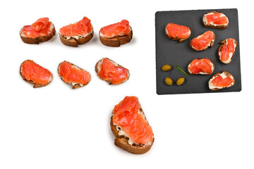 Salmon on a bread with cream isolated on white.