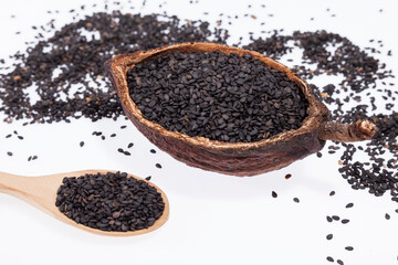 Black organic seeds of sesame - Sesamum indicum.