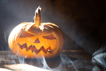 Halloween Pumpkins On Wood In A Spooky Night
