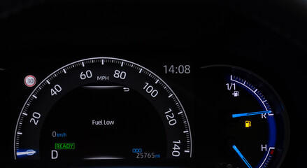 Petrol gauge on empty and fuel low 
