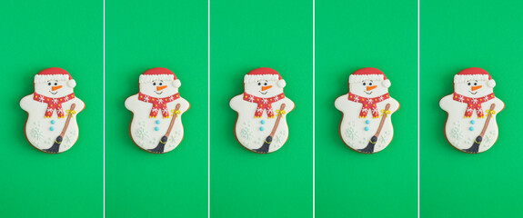 Christmas collage. Christmas gingerbread in the shape of a snowman on the green background. Copy space.