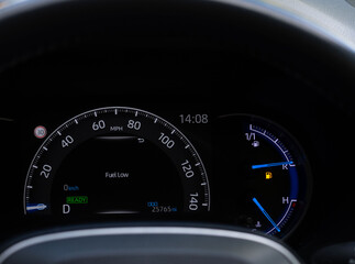 Petrol gauge on empty and fuel low 