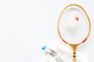 Sports equipment with badminton rackets towel and water