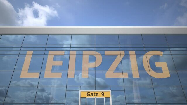 LEIPZIG text revealed with landing airplane on airport building
