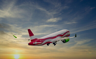 Sunset Airplane Travel. Airliner against the setting sun.