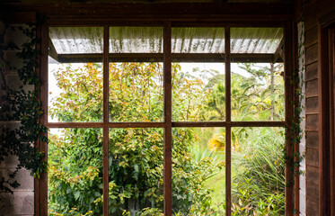 Big window in a cabin at the mountains