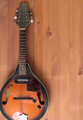 Obraz na płótnie Canvas Vintage country mandolin on wooden background