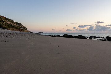 Industrial beach between Le Havre and Etretat on a rainy day in France, Europe 