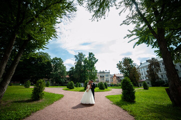Fototapeta premium Happy bride and groom after wedding ceremony