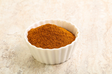 Dry Paprika powder in the bowl