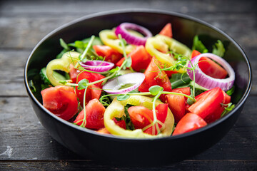 vegetable salad fresh tomato, cucumber, pepper, onion, olive oil healthy veggie meal snack on the table copy space food background rustic keto or paleo diet vegan