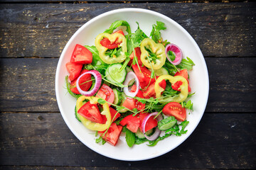 vegetable salad fresh tomato, cucumber, pepper, onion, olive oil healthy veggie meal snack on the table copy space food background rustic keto or paleo diet vegan