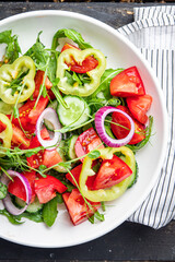 vegetable salad fresh tomato, cucumber, pepper, onion, olive oil healthy veggie meal snack on the table copy space food background rustic keto or paleo diet vegan