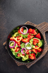 vegetable salad fresh tomato, cucumber, pepper, onion, olive oil healthy veggie meal snack on the table copy space food background rustic keto or paleo diet vegan