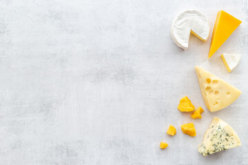 Various types of cheese - brie and blue cheese with parmesan