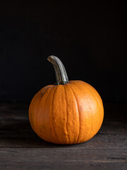 pumpkin on a wooden table