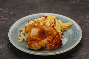 Pork schnitzel with roasted potato