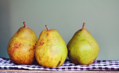 Organic Pears on a Green Backgound