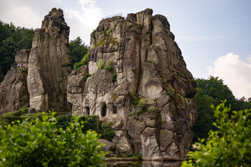 Fototapeta na wymiar The Externsteine, a prominent sandstone rock formation in the Teutoburg Forest, near the town of Horn-Bad Meinberg in the district of Lippe in North Rhine-Westphalia (Germany). 