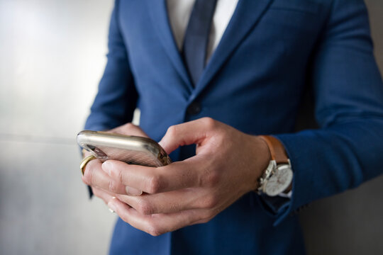 Close Up Businessman Using Smart Phone