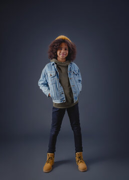 Lovely stylish teenage girl in denim jacket