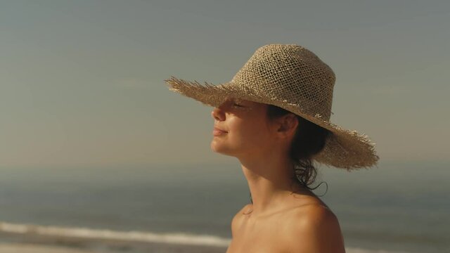 Beach Woman in Sun Hat on Vacation