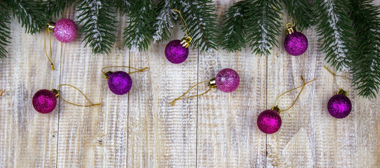 Christmas box of New Year's toys on a wooden background.