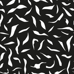Abstract leaf seamless repeat pattern. Random placed, vector shapes minimal all over print on black background.